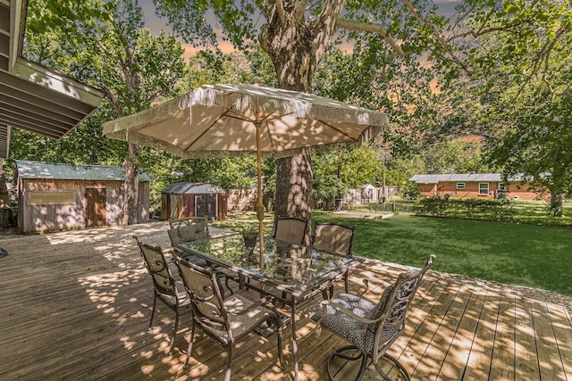 4714 Philco Dr, Austin, TX 78745 - deck at dusk featuring a storage shed and outdoor dining area