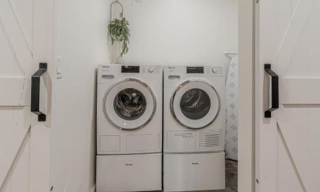 4714 Philco Dr, Austin, TX 78745 - laundry area with washing machine and clothes dryer