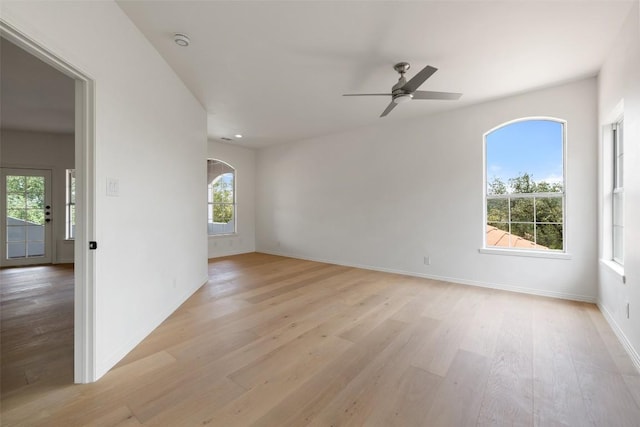8311 Sumner Ct, Austin, TX 78733 - empty room featuring light wood-style flooring, ceiling fan, and a smoke detector