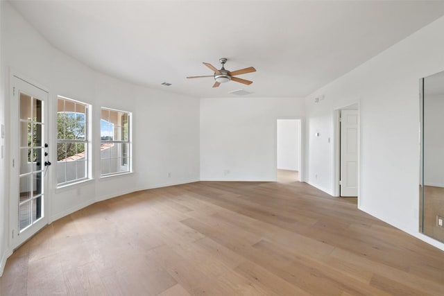 8311 Sumner Ct, Austin, TX 78733 - unfurnished room featuring light wood-type flooring and a ceiling fan