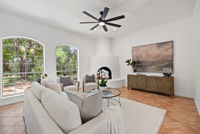 8311 Sumner Ct, Austin, TX 78733 - living room featuring a ceiling fan, light tile patterned floors, and recessed lighting