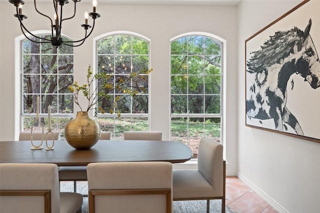 8311 Sumner Ct, Austin, TX 78733 - dining room featuring a chandelier and light tile patterned floors