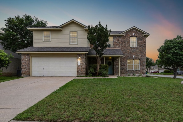 1609 Churchill Cv, Cedar Park, TX 78613 - traditional-style home featuring a front yard, driveway, a garage, brick siding, and a shingled roof