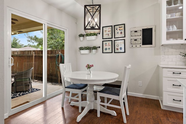 1609 Churchill Cv, Cedar Park, TX 78613 - dining space with dark wood-type flooring and baseboards