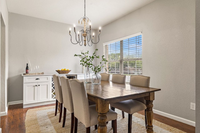 1609 Churchill Cv, Cedar Park, TX 78613 - dining space featuring a chandelier, baseboards, and wood finished floors