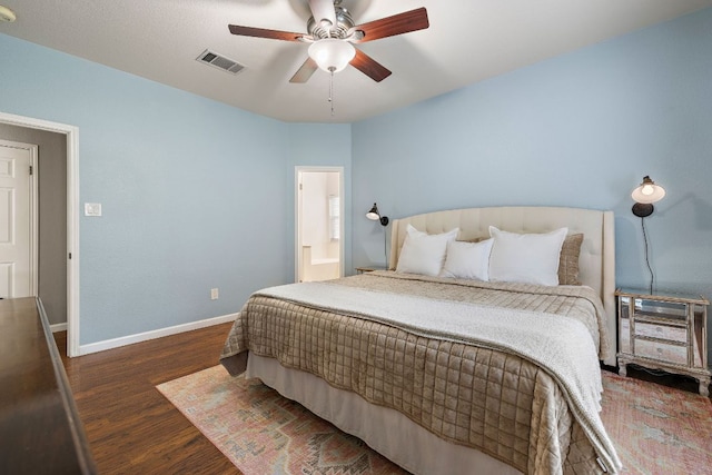 1609 Churchill Cv, Cedar Park, TX 78613 - bedroom with wood finished floors, baseboards, a ceiling fan, and connected bathroom