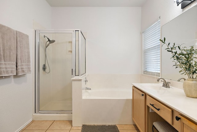 1609 Churchill Cv, Cedar Park, TX 78613 - bathroom featuring a stall shower, a bath, vanity, and tile patterned flooring