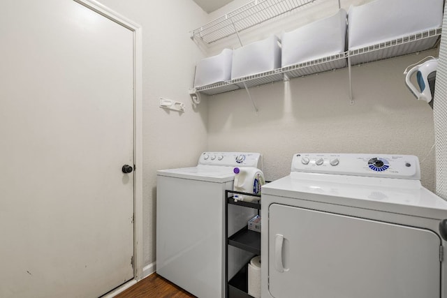 1609 Churchill Cv, Cedar Park, TX 78613 - laundry area with washer and clothes dryer and dark wood finished floors