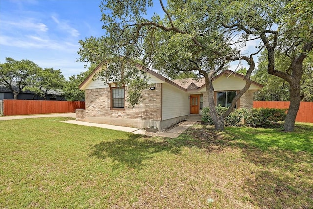 707 Shamrock Dr, Leander, TX 78641 - rear view of house featuring brick siding