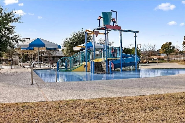 2121 Local Rebel Loop, Leander, TX 78641 - community playground featuring a water play area