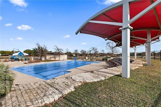 2121 Local Rebel Loop, Leander, TX 78641 - community pool with a patio