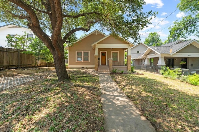 4314 Duval St, Austin, TX 78751 - view of front facade with a porch and crawl space