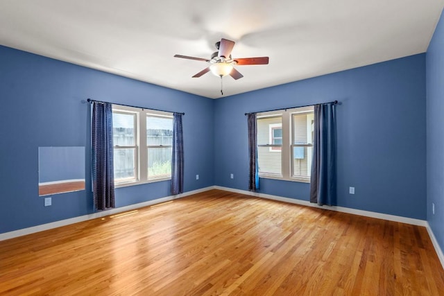 4314 Duval St, Austin, TX 78751 - unfurnished room with a ceiling fan, light wood-type flooring, and baseboards