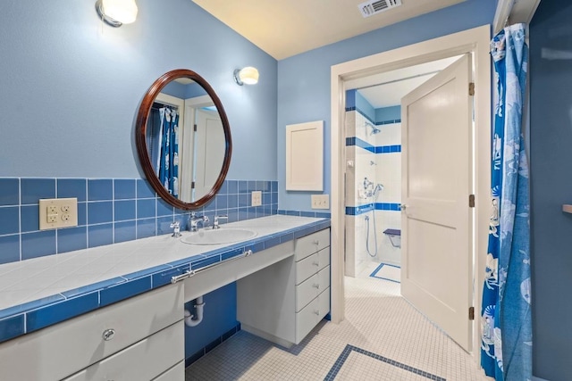 4314 Duval St, Austin, TX 78751 - bathroom featuring vanity, a shower with curtain, and tile patterned flooring