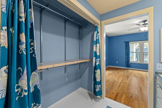 4314 Duval St, Austin, TX 78751 - walk in closet with wood finished floors
