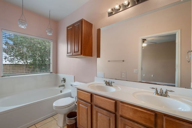 3809 Bronco Bend Loop, Austin, TX 78744 - full bathroom with double vanity, a garden tub, toilet, tile patterned floors, and a ceiling fan