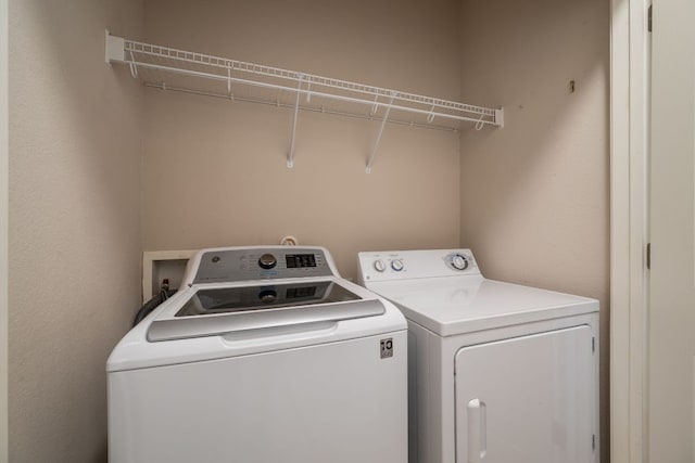 3809 Bronco Bend Loop, Austin, TX 78744 - laundry area featuring separate washer and dryer