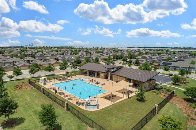 3809 Bronco Bend Loop, Austin, TX 78744 - community pool featuring a patio area and a residential view