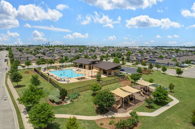3809 Bronco Bend Loop, Austin, TX 78744 - aerial view of residential area featuring a pool area