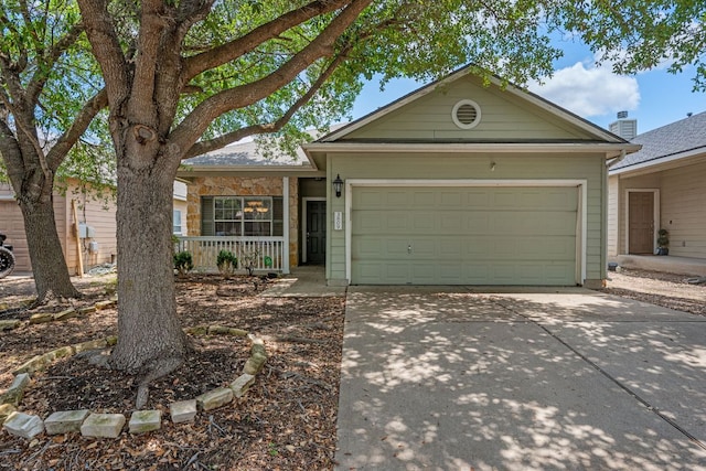 3809 Bronco Bend Loop, Austin, TX 78744 - single story home with concrete driveway, an attached garage, and covered porch