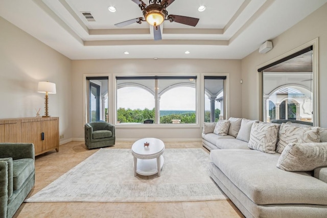 12529 Verandah Ct, Austin, TX 78726 - living area featuring a tray ceiling, recessed lighting, and a ceiling fan