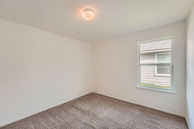 14309 Deaf Smith Blvd, Austin, TX 78725 - carpeted empty room with baseboards