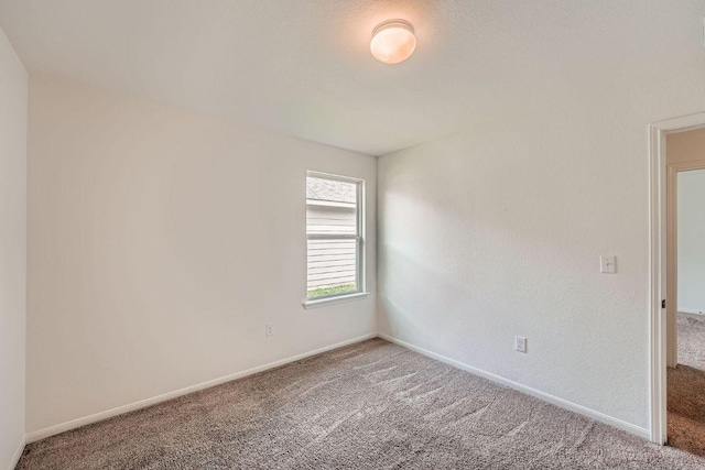 14309 Deaf Smith Blvd, Austin, TX 78725 - unfurnished room featuring carpet floors and baseboards