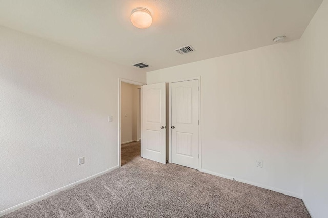 14309 Deaf Smith Blvd, Austin, TX 78725 - unfurnished bedroom featuring carpet flooring, baseboards, and a closet