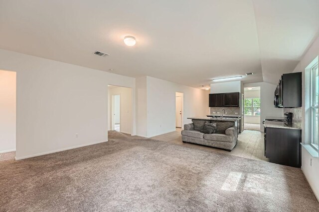 14309 Deaf Smith Blvd, Austin, TX 78725 - living area with light carpet and baseboards