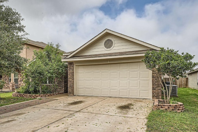 14309 Deaf Smith Blvd, Austin, TX 78725 - ranch-style home featuring concrete driveway, brick siding, central AC, and an outbuilding