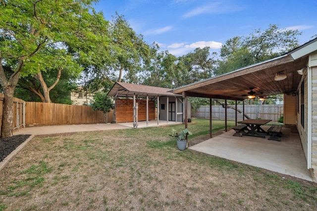 7701 Lowdes Dr, Austin, TX 78745 - view of yard featuring a patio area and a ceiling fan