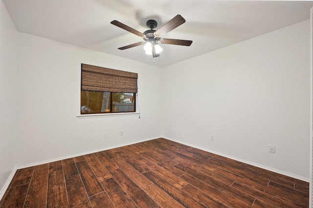 7701 Lowdes Dr, Austin, TX 78745 - unfurnished room featuring dark wood-style flooring and a ceiling fan
