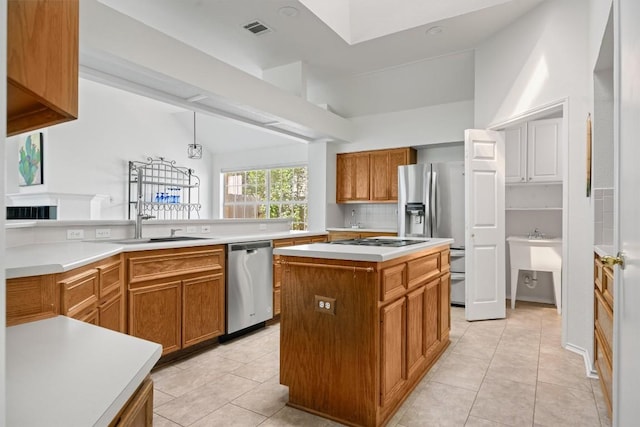 9205 Amanda Dr, Austin, TX 78729 - kitchen with stainless steel appliances, brown cabinetry, light tile patterned floors, light countertops, and high vaulted ceiling