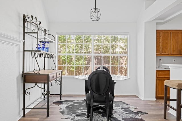 9205 Amanda Dr, Austin, TX 78729 - home office with healthy amount of natural light, wood finished floors, and lofted ceiling