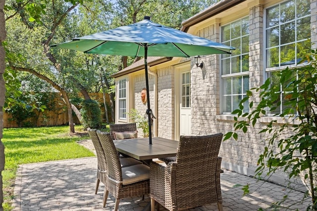9205 Amanda Dr, Austin, TX 78729 - view of patio / terrace featuring outdoor dining area