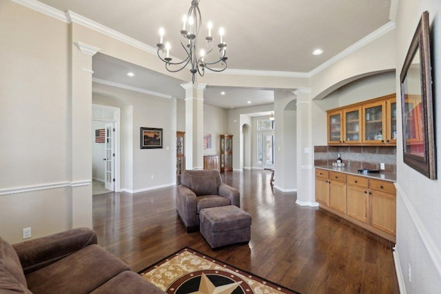 816 Drifting Wind Run, Dripping Springs, TX 78620 - living room featuring ornate columns, dark wood-type flooring, crown molding, baseboards, and recessed lighting