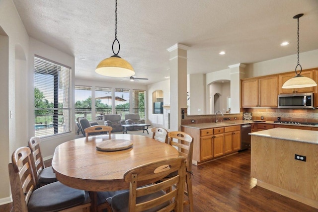 816 Drifting Wind Run, Dripping Springs, TX 78620 - dining room featuring dark wood finished floors, a ceiling fan, recessed lighting, a textured ceiling, and baseboards