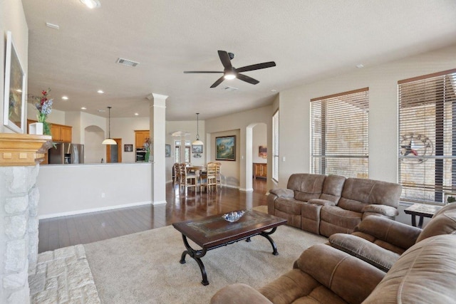 816 Drifting Wind Run, Dripping Springs, TX 78620 - living room with wood finished floors, a ceiling fan, arched walkways, recessed lighting, and baseboards