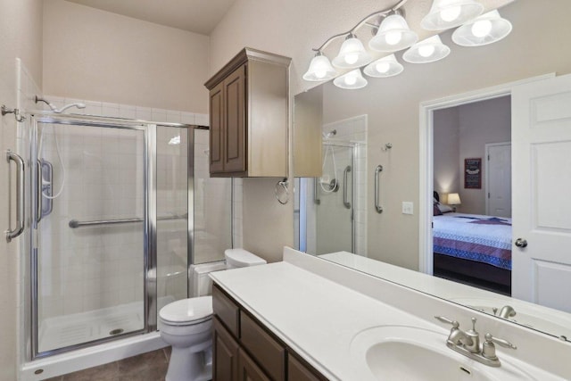 816 Drifting Wind Run, Dripping Springs, TX 78620 - ensuite bathroom with a shower stall, vanity, and toilet