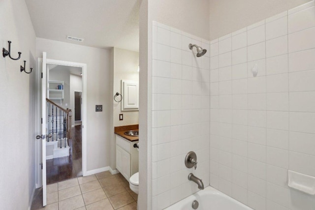 816 Drifting Wind Run, Dripping Springs, TX 78620 - bathroom with vanity, tub / shower combination, toilet, tile patterned floors, and baseboards