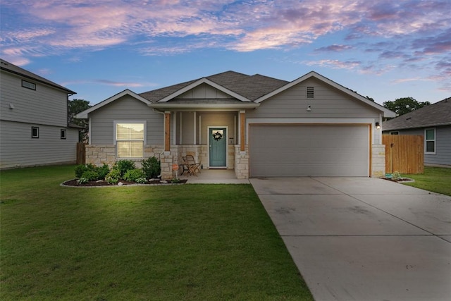 268 Bunting Ln, Bertram, TX 78605 - view of front of property with a garage, concrete driveway, stone siding, and a shingled roof