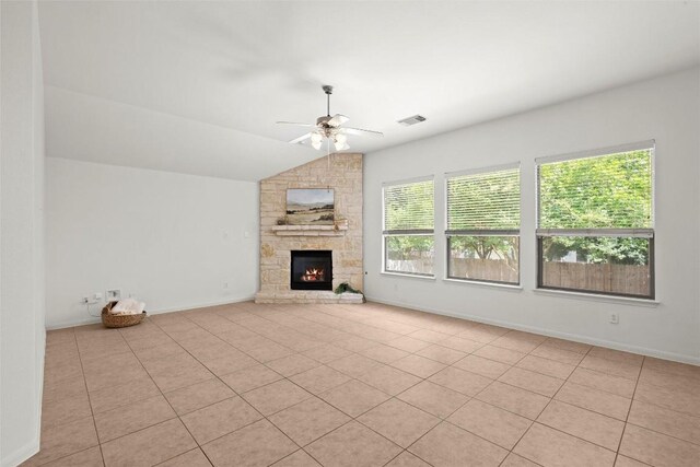260 Kiras Ct, Austin, TX 78737 - unfurnished living room featuring ceiling fan, a fireplace, lofted ceiling, light tile patterned floors, and baseboards