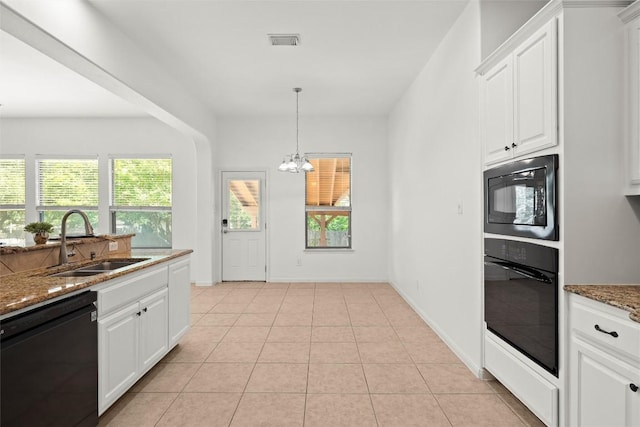 260 Kiras Ct, Austin, TX 78737 - kitchen featuring black appliances, a sink, dark stone counters, and white cabinets