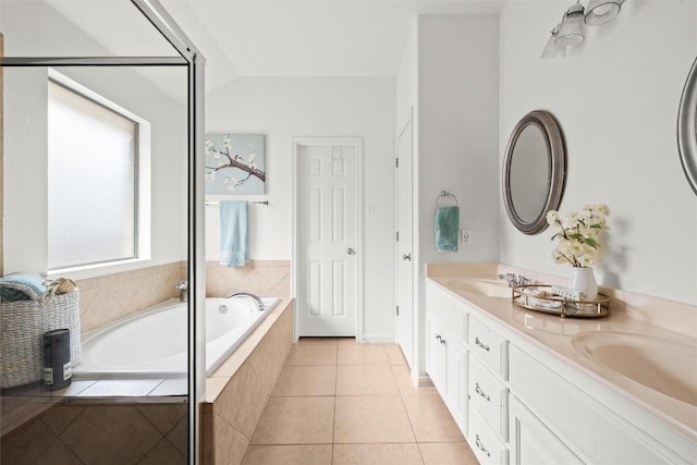 260 Kiras Ct, Austin, TX 78737 - bathroom featuring double vanity, a garden tub, and tile patterned floors