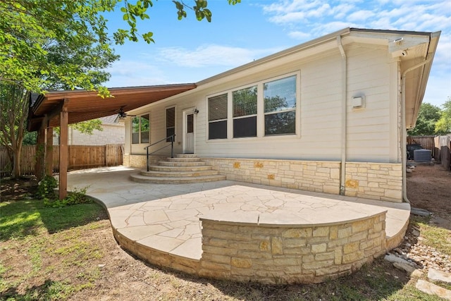 260 Kiras Ct, Austin, TX 78737 - rear view of house with a patio area and central air condition unit