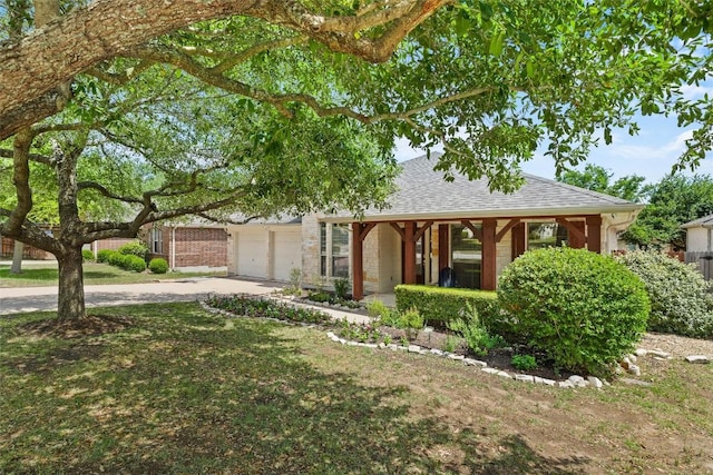 260 Kiras Ct, Austin, TX 78737 - view of front of home featuring driveway, a shingled roof, and a garage