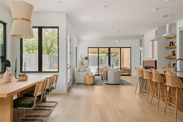 7809 Hardy Dr, Austin, TX 78757 - dining area with light wood-type flooring