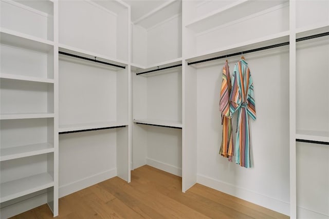 7809 Hardy Dr, Austin, TX 78757 - walk in closet with wood finished floors