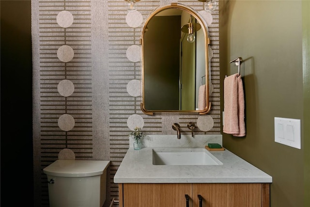7809 Hardy Dr, Austin, TX 78757 - half bathroom with vanity and toilet