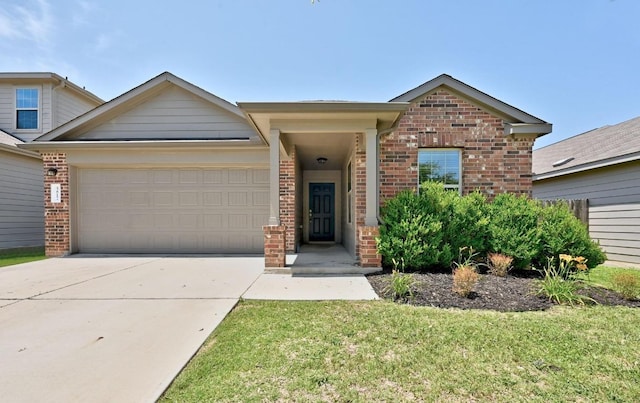 5817 Bell Tower Ln, Austin, TX 78747 - view of front of home featuring brick siding, an attached garage, and driveway